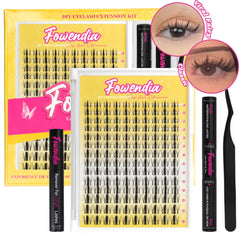 Fowendia "Wanna Be" DIY Eyelash Extension Short Kit, which includes one pack of false eyelashes, a tube of water-resistant lash adhesive, a cluster lash remover, and a lash applicator. The packaging is predominantly yellow with pink accents and features the Fowendia brand name. An inset image showcases an eye with the applied eyelashes, highlighting the 'Viral Fairy' and 'Classic Manga'style.